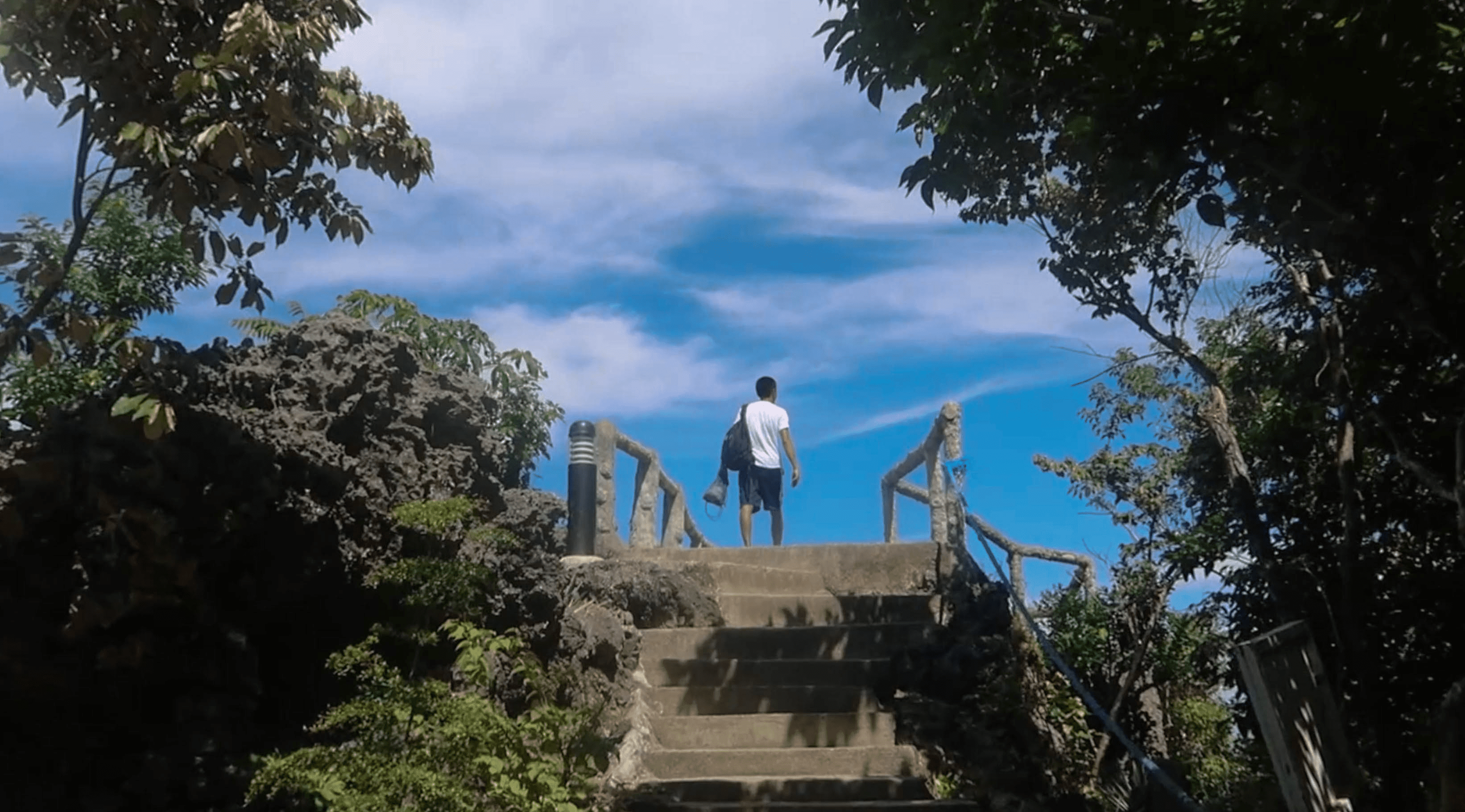 reynold standing at observation deck at hundred islands nature park in pangasinan philippines